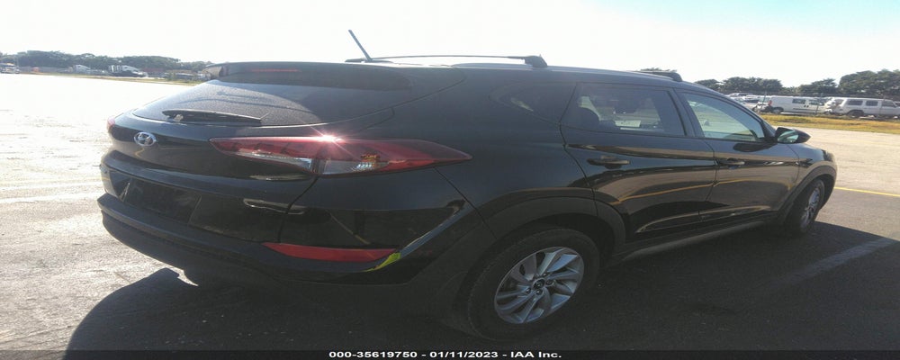 KM8J33A43GU255061 2016 HYUNDAI TUCSON photo no. 4