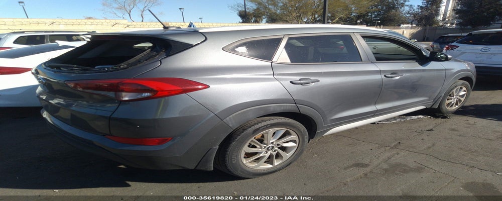 KM8J33A40HU423627 2017 HYUNDAI TUCSON photo no. 4