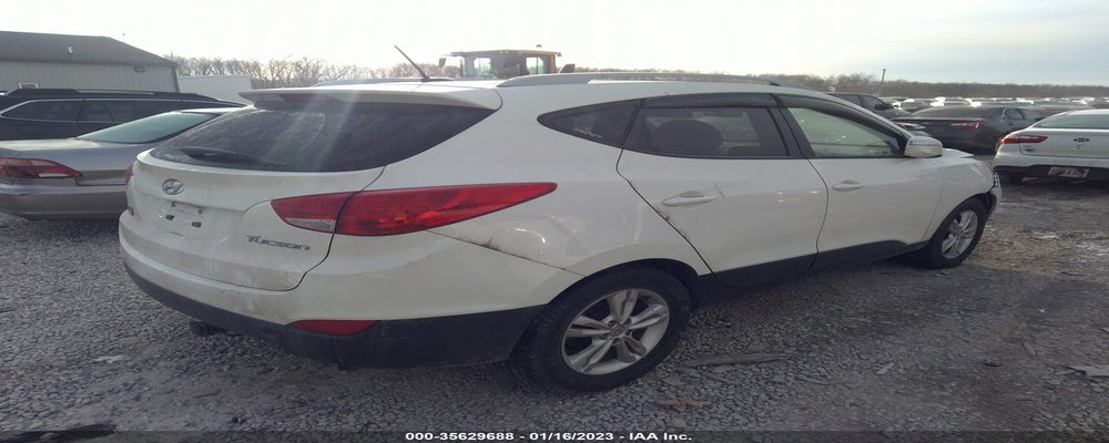KM8JU3AC4CU419223 2012 HYUNDAI TUCSON photo no. 4