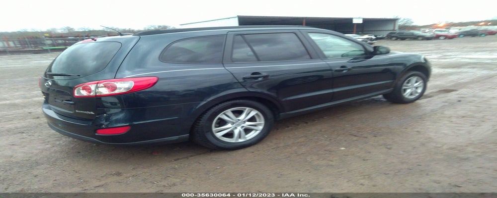 5NMSG3AB3AH399252 2010 HYUNDAI SANTA FE photo no. 4