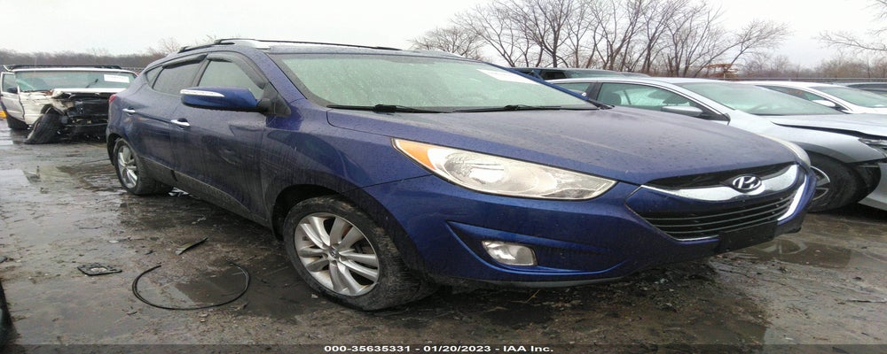 KM8JU3AC4CU354597 2012 HYUNDAI TUCSON photo no. 11
