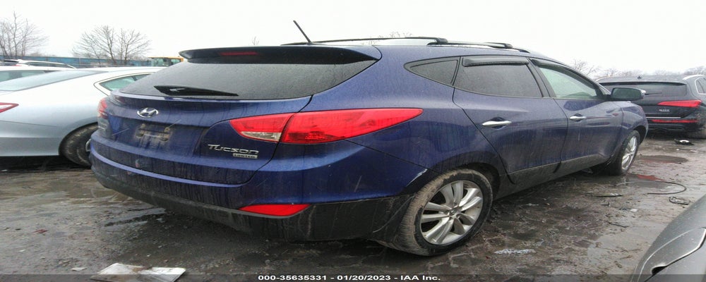 KM8JU3AC4CU354597 2012 HYUNDAI TUCSON photo no. 4