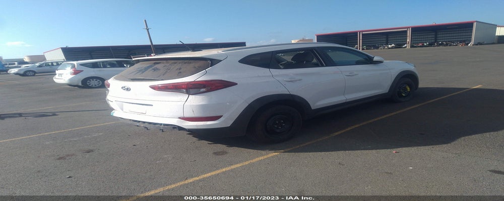KM8J33A44GU063101 2016 HYUNDAI TUCSON photo no. 4