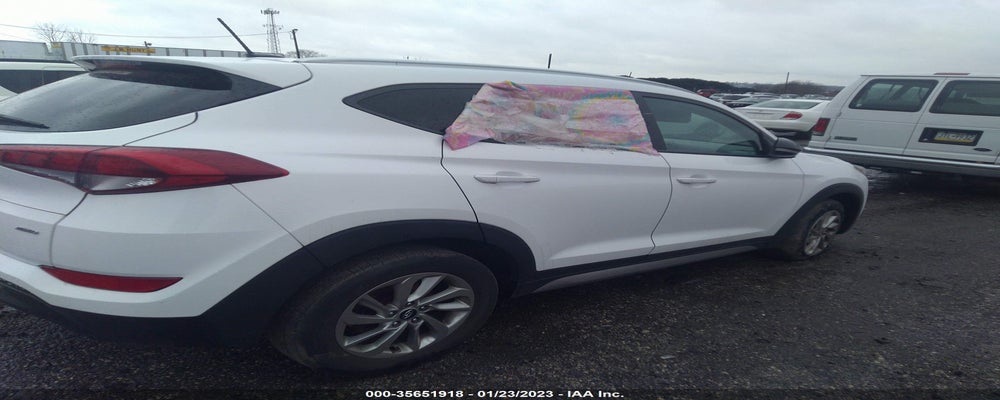 KM8J3CA45HU276933 2017 HYUNDAI TUCSON photo no. 4