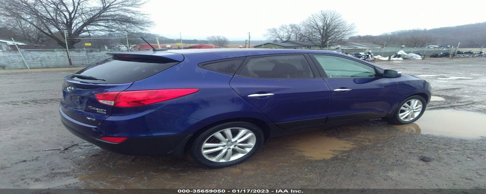 KM8JU3AC5DU604852 2013 HYUNDAI TUCSON photo no. 4