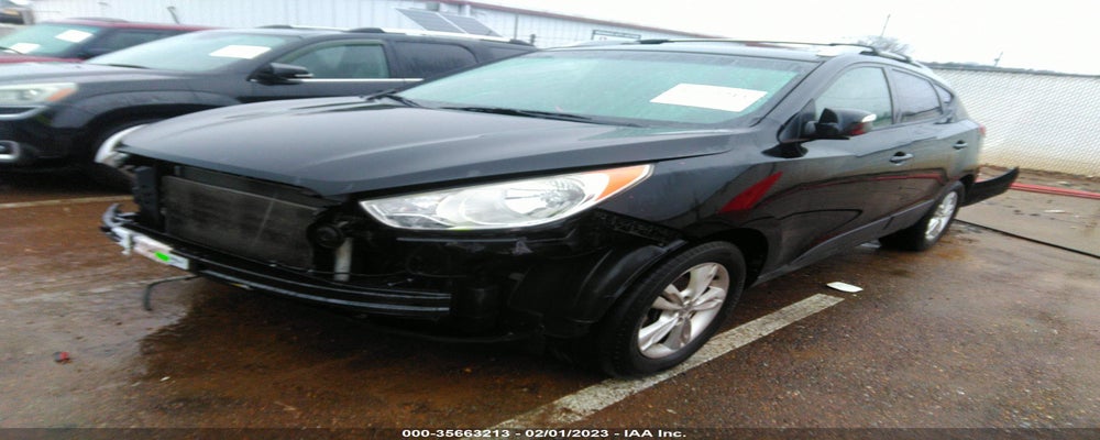 KM8JU3AC6CU344735 2012 HYUNDAI TUCSON photo no. 2
