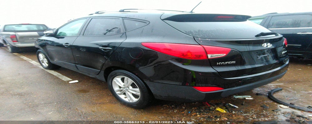 KM8JU3AC6CU344735 2012 HYUNDAI TUCSON photo no. 3
