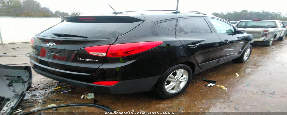 KM8JU3AC6CU344735 2012 HYUNDAI TUCSON photo no. 4