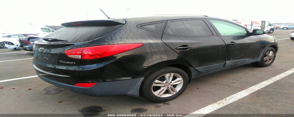 KM8JU3AC2DU769791 2013 HYUNDAI TUCSON photo no. 4