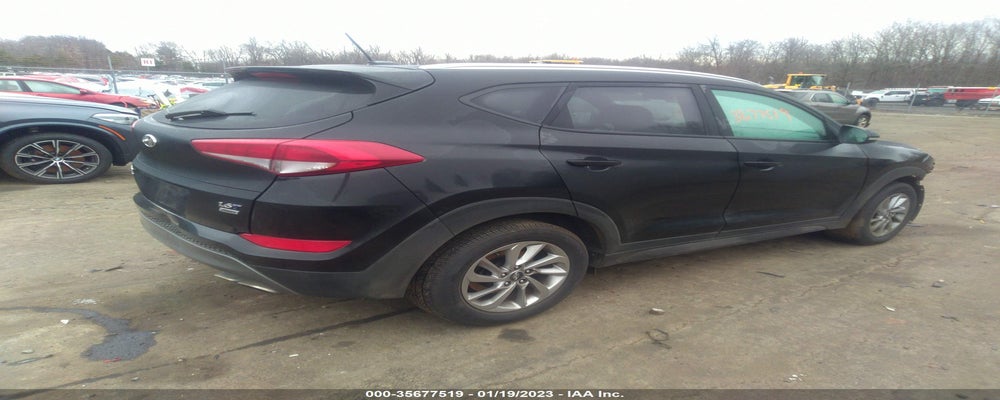 KM8J3CA26GU165062 2016 HYUNDAI TUCSON photo no. 4