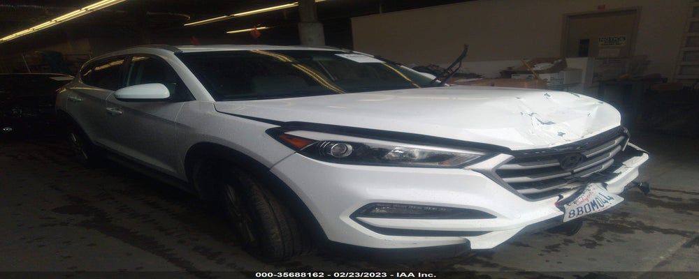 KM8J33A41JU606556 2018 HYUNDAI TUCSON photo no. 4