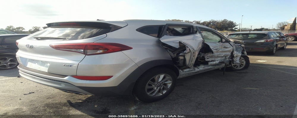 KM8J33A28HU333057 2017 HYUNDAI TUCSON photo no. 4