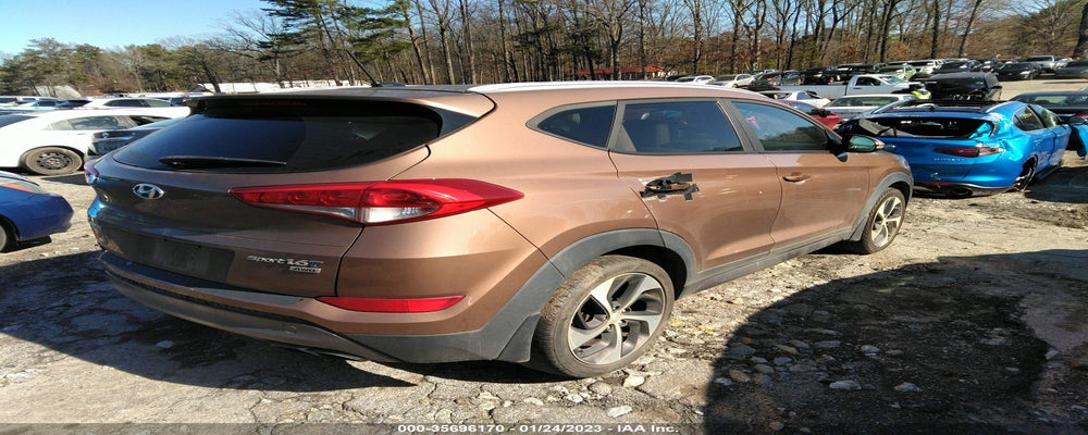 KM8J3CA2XGU182401 2016 HYUNDAI TUCSON photo no. 4