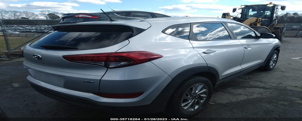 KM8J3CA42GU160801 2016 HYUNDAI TUCSON photo no. 4