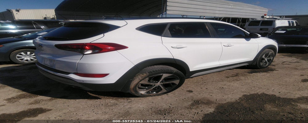 KM8J33A29JU818135 2018 HYUNDAI TUCSON photo no. 4