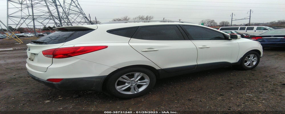 KM8JU3AC1CU458884 2012 HYUNDAI TUCSON photo no. 4