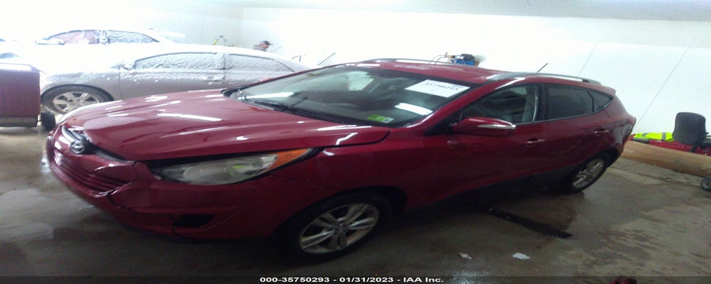 KM8JUCAC9CU346902 2012 HYUNDAI TUCSON photo no. 2