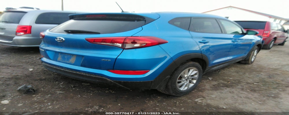 KM8J3CA41GU209244 2016 HYUNDAI TUCSON photo no. 4