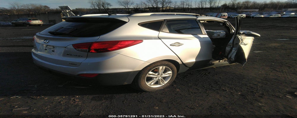 KM8JUCAC5DU743153 2013 HYUNDAI TUCSON photo no. 4