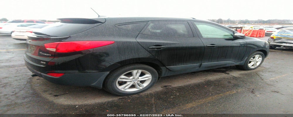 KM8JUCACXDU564168 2013 HYUNDAI TUCSON photo no. 4