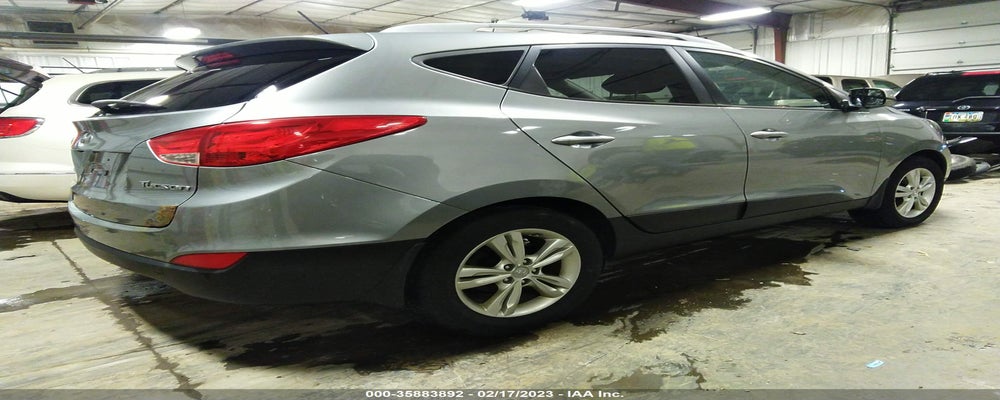 KM8JU3AC9BU169654 2011 HYUNDAI TUCSON photo no. 4