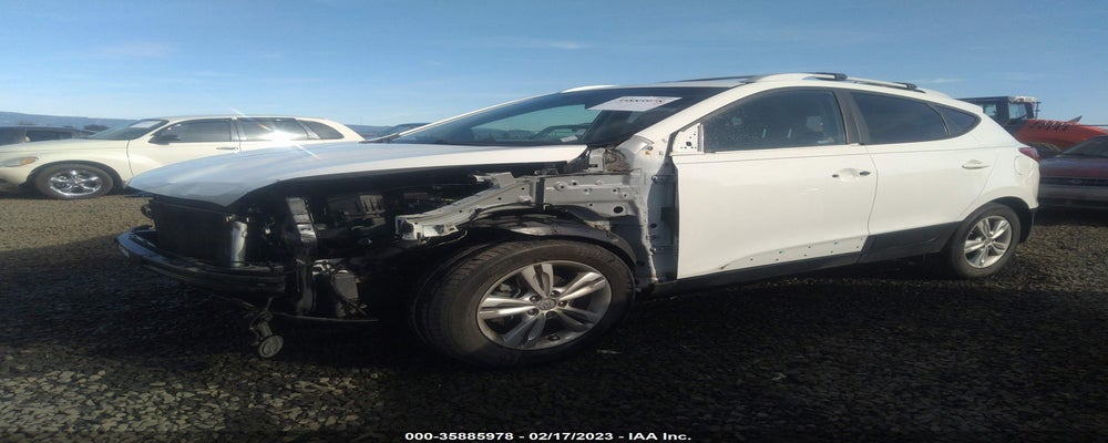 KM8JUCAC5CU464753 2012 HYUNDAI TUCSON photo no. 2
