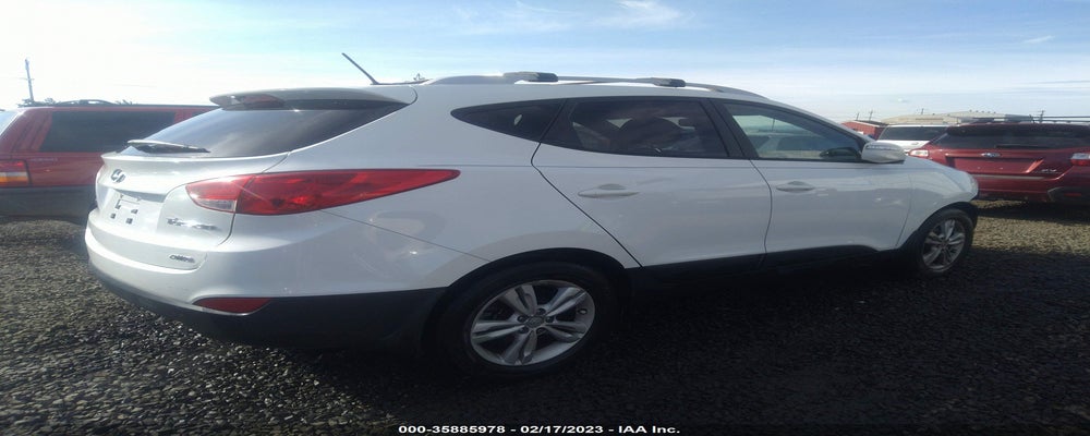 KM8JUCAC5CU464753 2012 HYUNDAI TUCSON photo no. 4