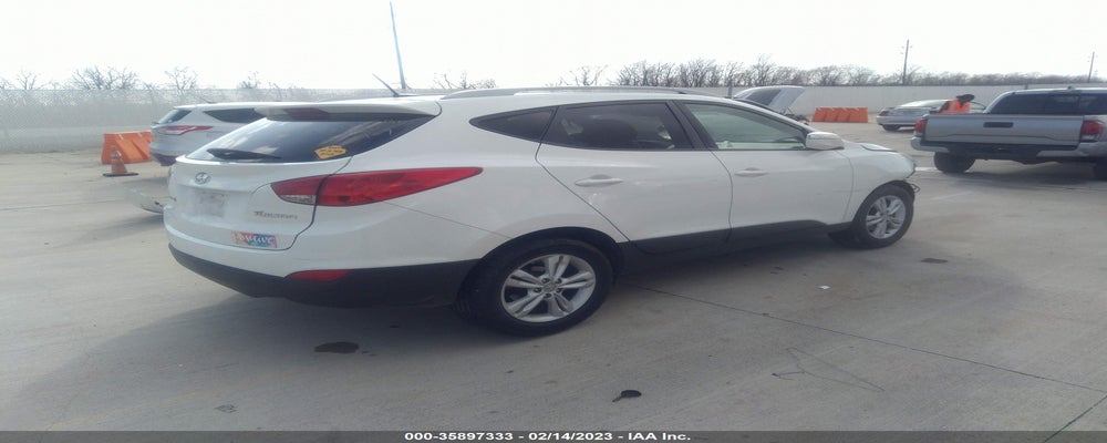 KM8JU3AC4DU572671 2013 HYUNDAI TUCSON photo no. 4