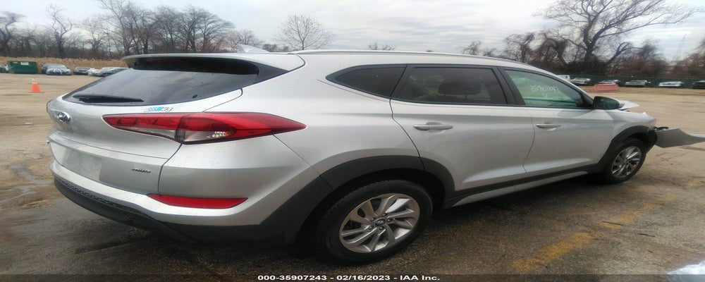 KM8J3CA47JU743808 2018 HYUNDAI TUCSON photo no. 4