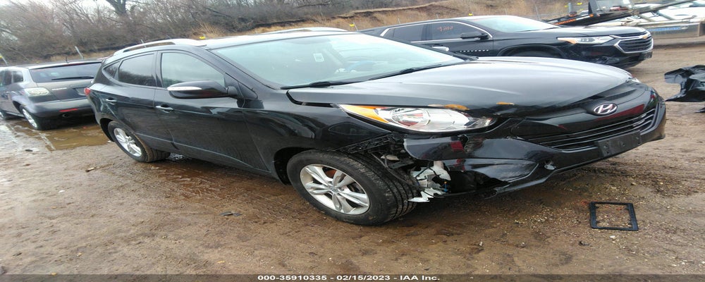 KM8JU3AC1CU322576 2012 HYUNDAI TUCSON photo no. 5