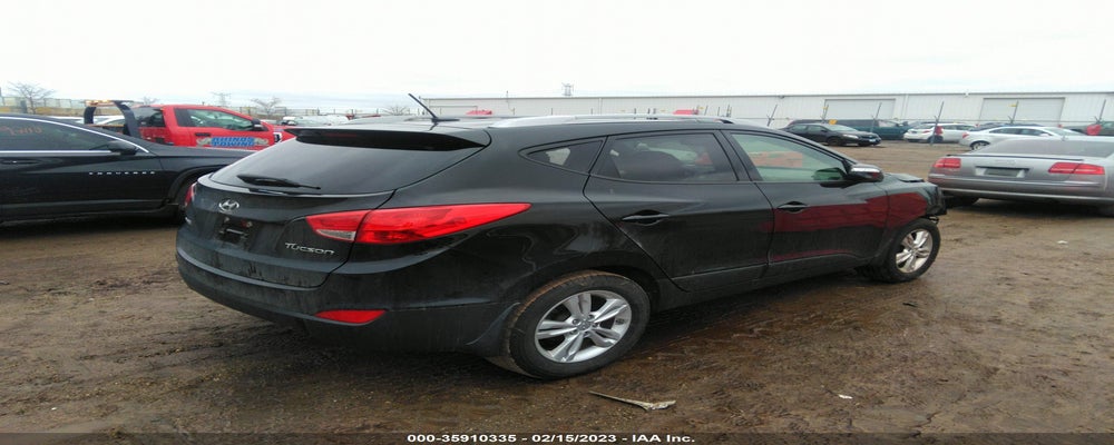 KM8JU3AC1CU322576 2012 HYUNDAI TUCSON photo no. 4