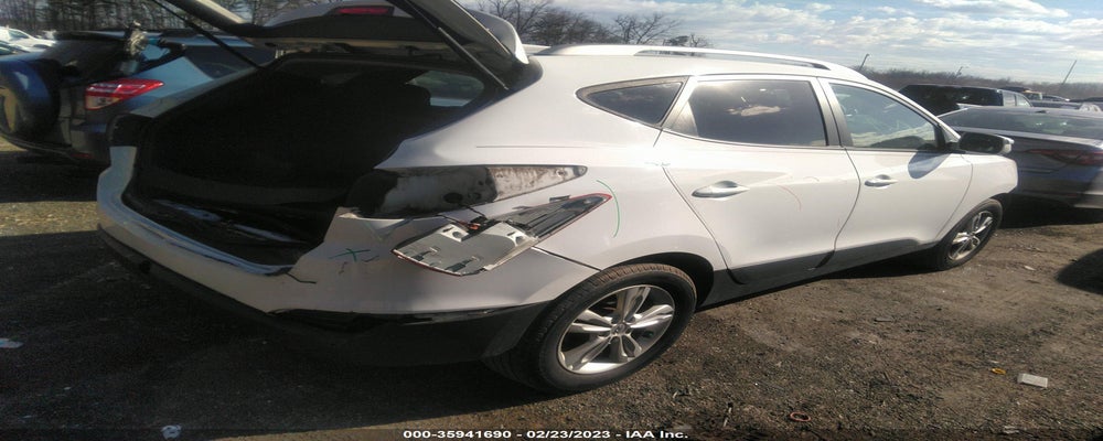 KM8JU3AC8DU760058 2013 HYUNDAI TUCSON photo no. 4