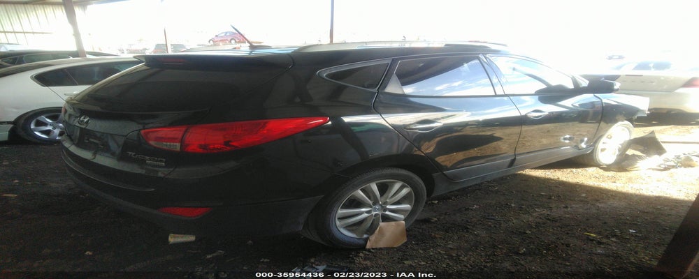 KM8JU3AC7CU420124 2012 HYUNDAI TUCSON photo no. 4