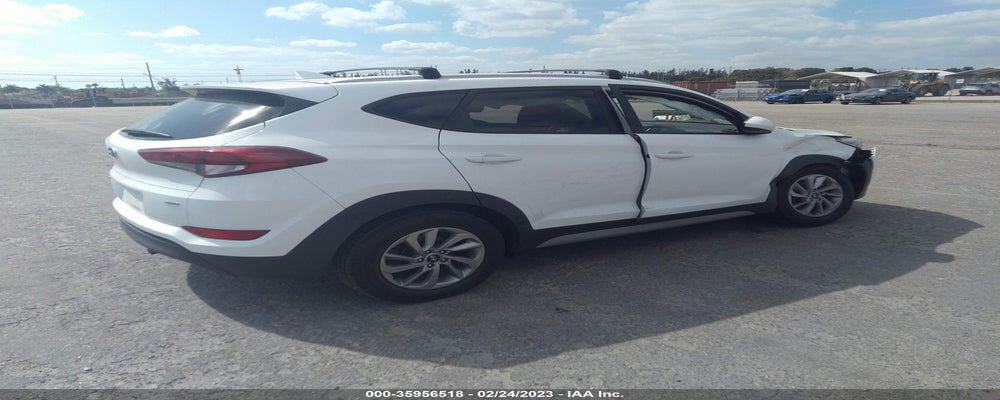 KM8J3CA41JU684528 2018 HYUNDAI TUCSON photo no. 4