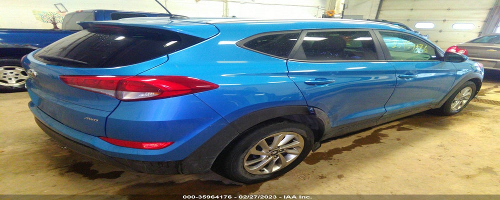 KM8J3CA49GU125723 2016 HYUNDAI TUCSON photo no. 4