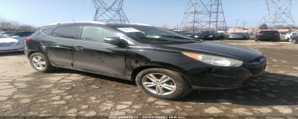 KM8JUCAC7CU470652 2012 HYUNDAI TUCSON photo no. 21