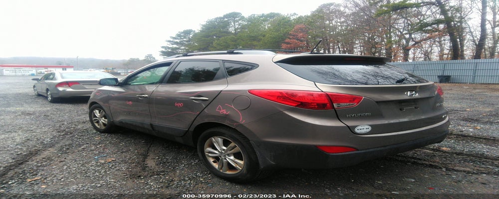 KM8JUCAC5CU395577 2012 HYUNDAI TUCSON photo no. 3
