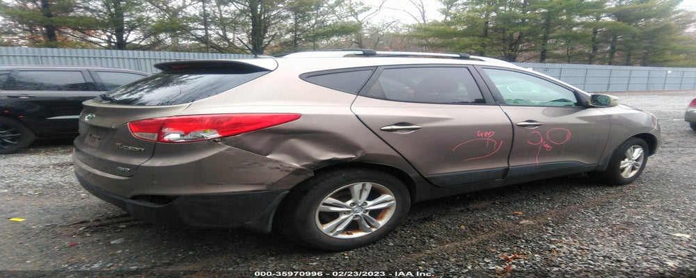 KM8JUCAC5CU395577 2012 HYUNDAI TUCSON photo no. 4