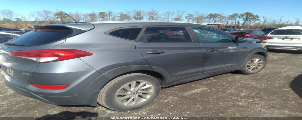 KM8J3CA42GU216798 2016 HYUNDAI TUCSON photo no. 4