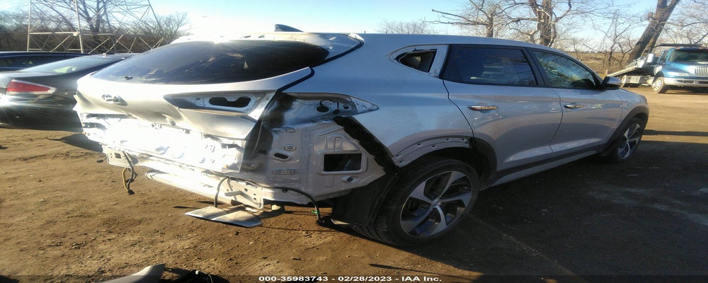KM8J3CA29JU669810 2018 HYUNDAI TUCSON photo no. 4