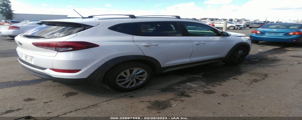 KM8J33A47HU284810 2017 HYUNDAI TUCSON photo no. 4