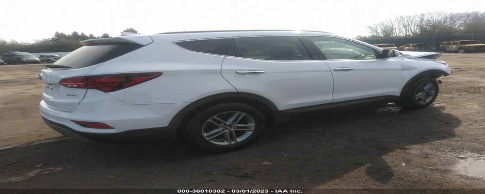 5NMZU3LB6JH087804 2018 HYUNDAI SANTA FE SPORT photo no. 4