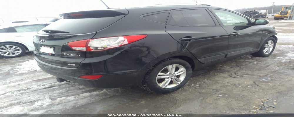 KM8JUCAC4CU491670 2012 HYUNDAI TUCSON photo no. 4