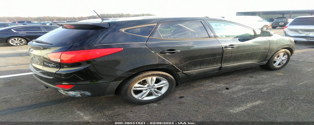 KM8JU3AC9DU755418 2013 HYUNDAI TUCSON photo no. 4