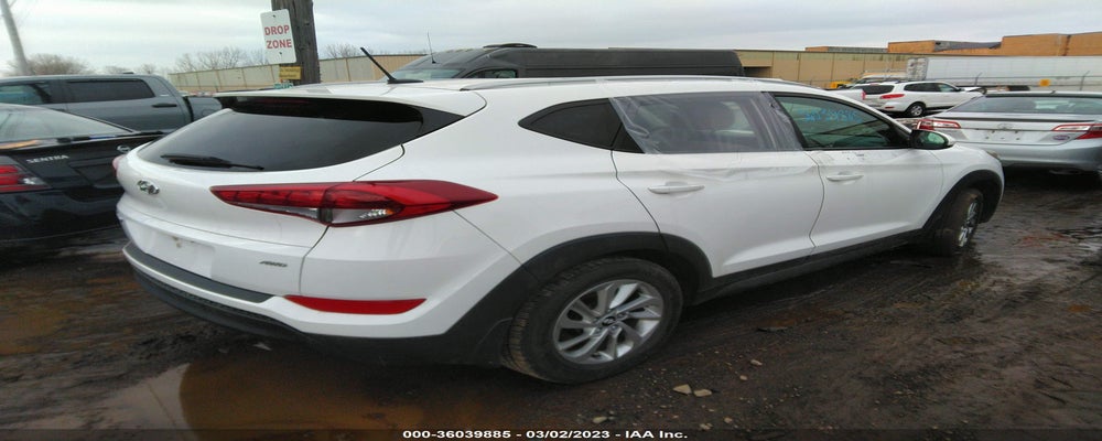 KM8J3CA4XGU208707 2016 HYUNDAI TUCSON photo no. 4
