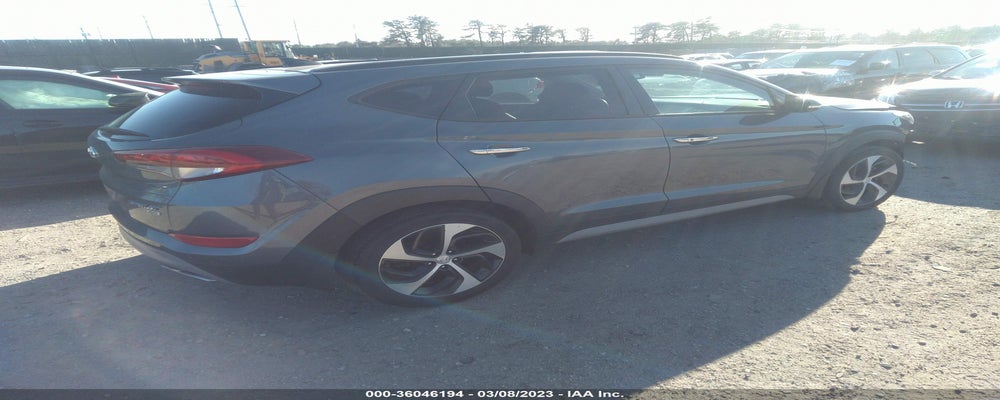 KM8J3CA23JU606363 2018 HYUNDAI TUCSON photo no. 4