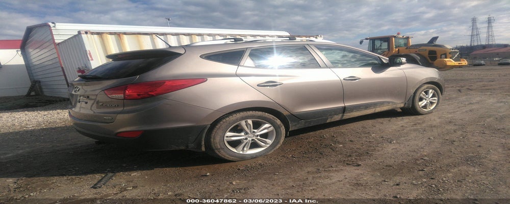 KM8JUCAC4CU418864 2012 HYUNDAI TUCSON photo no. 4