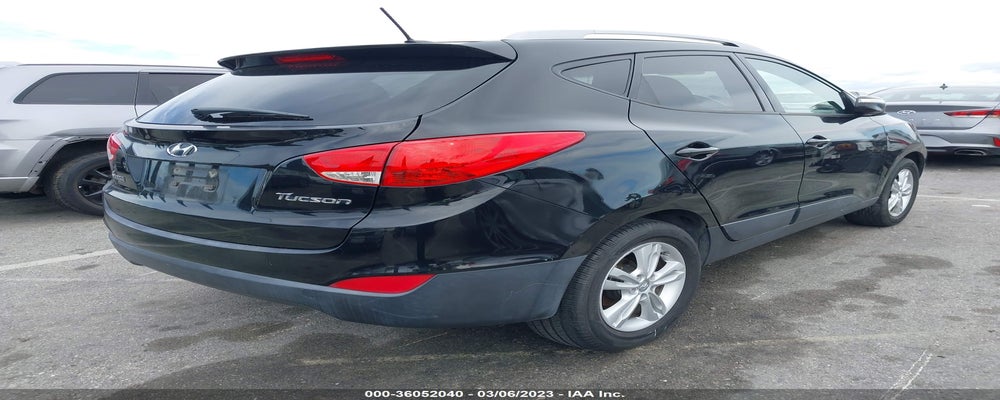 KM8JU3AC8CU357065 2012 HYUNDAI TUCSON photo no. 4