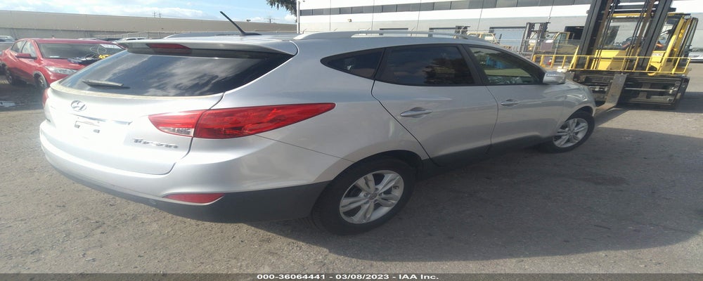 KM8JU3AC1CU483090 2012 HYUNDAI TUCSON photo no. 4
