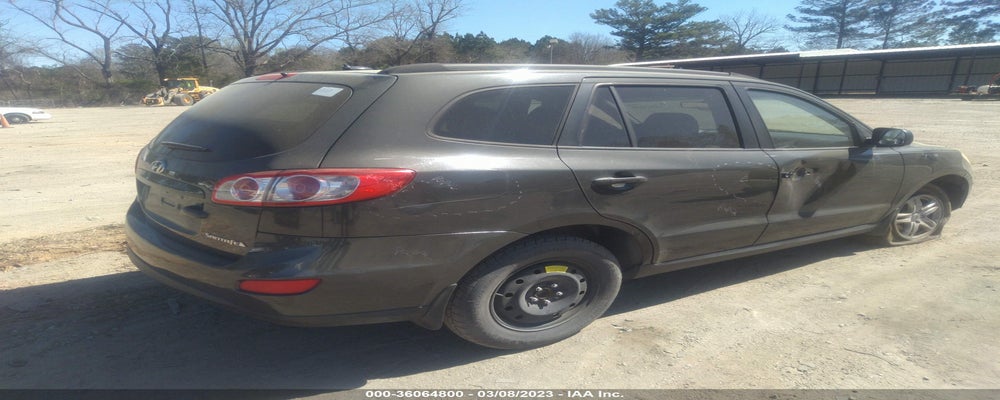 5NMSG3AB7AH391302 2010 HYUNDAI SANTA FE photo no. 4